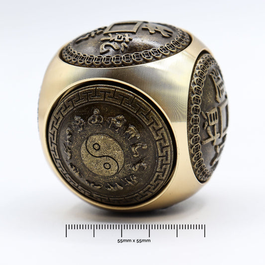 Brass Feng Shui Wealth Spinner – 5.5 CM brass spinner with yin yang and Chinese motif panels, 55mm size shown