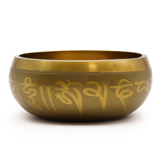 Alt Tag: Brass Ganesh Singing Bowl – 11x6 CM de latón con grabado tibetano, cuenco para meditación, vista frontal sobre fondo blanco