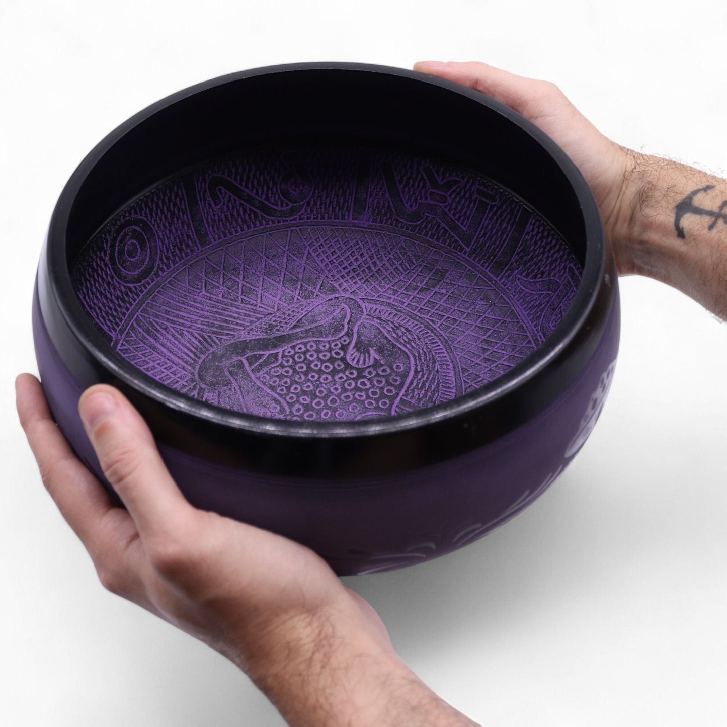 Alt Tag: Brass Singing Bowl – Purple Haze 23x10.5 CM, purple brass meditation singing bowl with etched interior pattern, held in hands