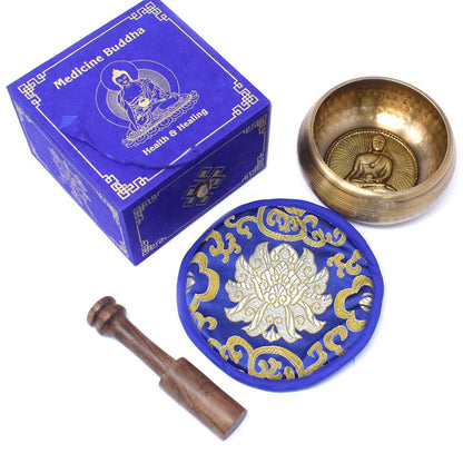 Alt Tag: Brass Tibetan Singing Bowl Set – 10CM with brass bowl, wooden mallet, blue cushion and Buddha gift box