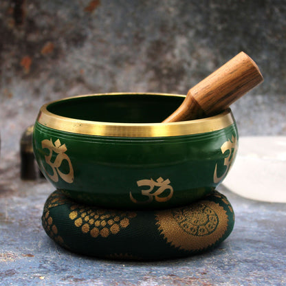 Alt Tag: Brass Tree of Life Singing Bowl Set – Green 14CM, green brass bowl with wooden striker and cushion, Om symbol detail