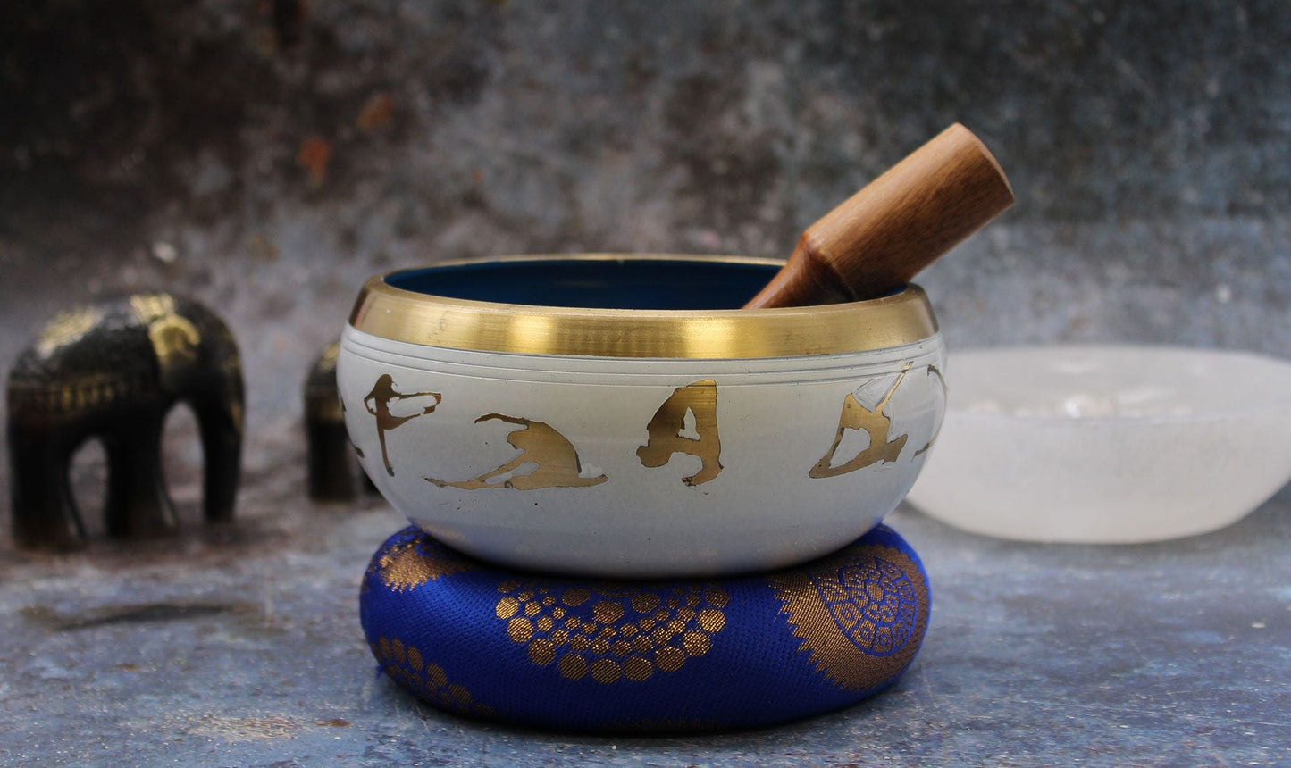 Brass and Wood Tibetan Singing Bowl – White/Blue 14CM white and blue brass bowl with wooden striker on blue cushion