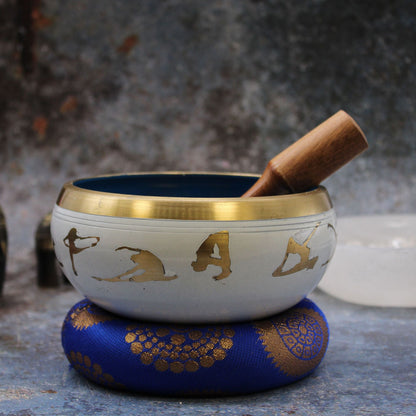 Brass and Wood Tibetan Singing Bowl – White/Blue 14CM with wooden striker and blue cushion, brass rim and white bowl