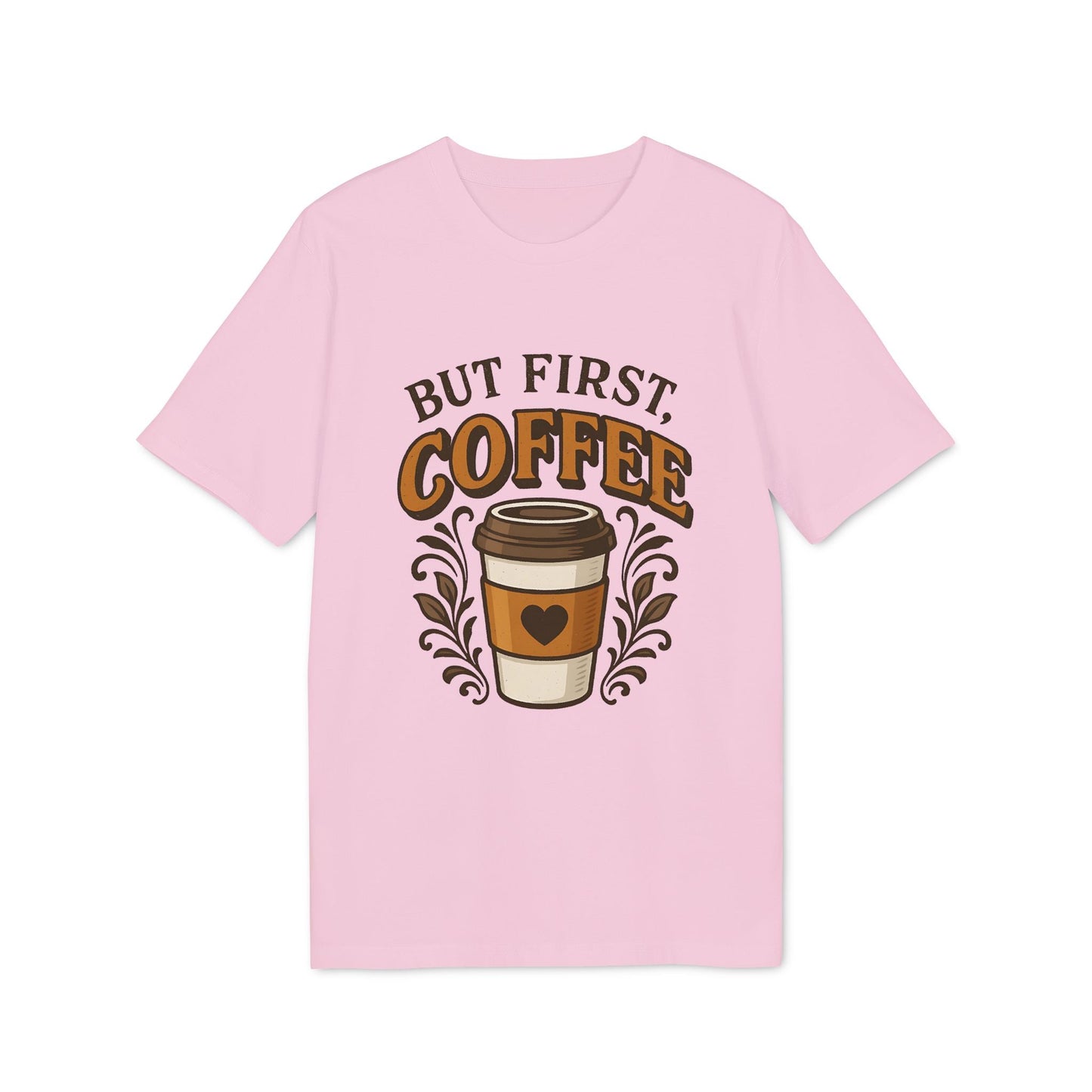 But First Coffee 100% Organic Cotton T-Shirt en rosa con gráfico de vaso de café y texto “BUT FIRST COFFEE”