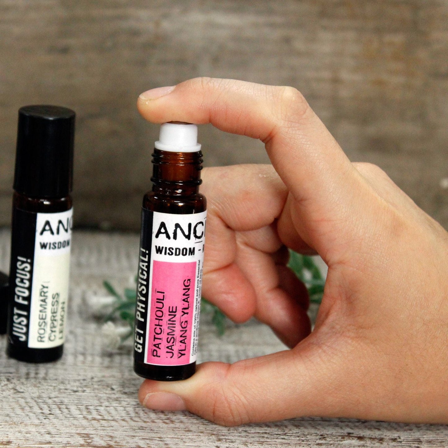 Alt Tag: Calming Essential Oil Blend – 10ML Roll-On bottle held in hand, roll-on applicator with essential oil blend label