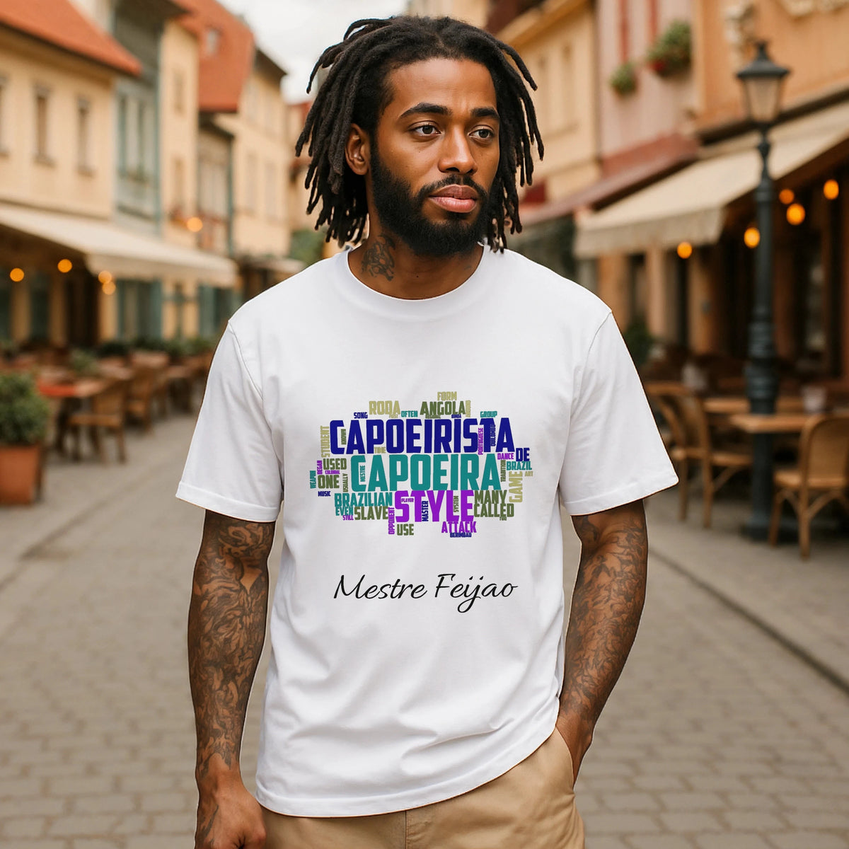 Alt Tag: Capoeira Personalized Premium Unisex T-Shirt worn by man, white tee with colorful capoeira word art and custom name “Mestre Feijão”
