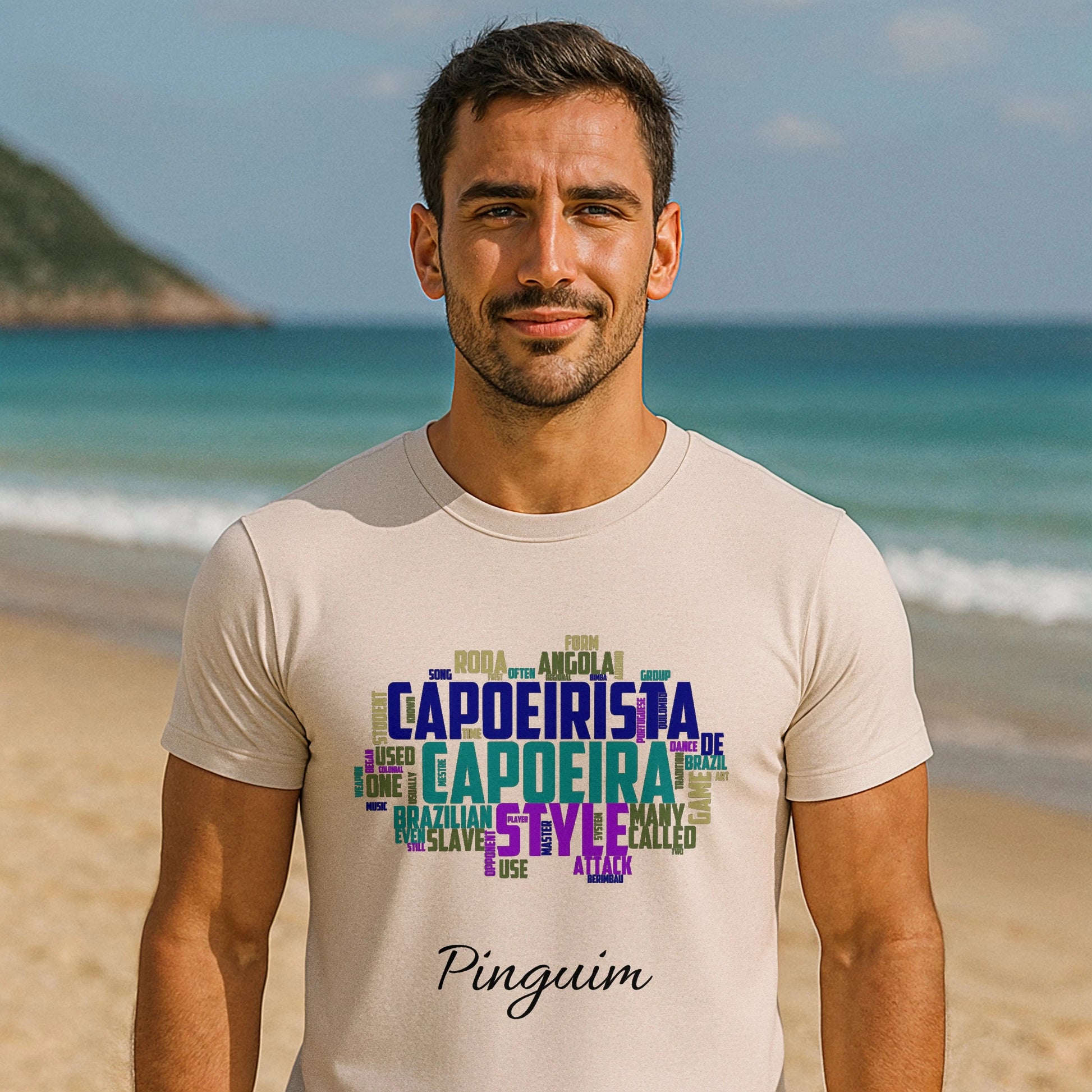 Capoeira Personalized Premium Unisex T-Shirt on male model, beige tee with colorful capoeira word art and “Pinguim” text