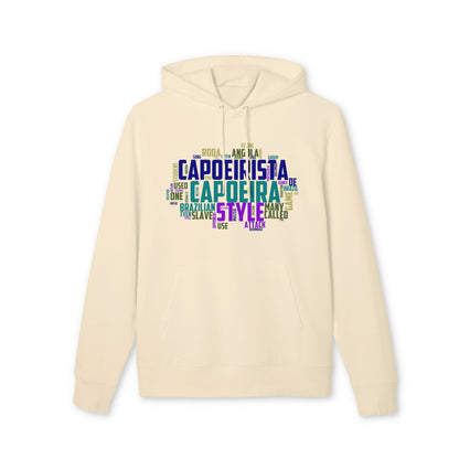 Alt Tag: Capoeira Sustainable Unisex Hoodie de algodón orgánico color crema con diseño tipográfico multicolor “Capoeira” en el pecho