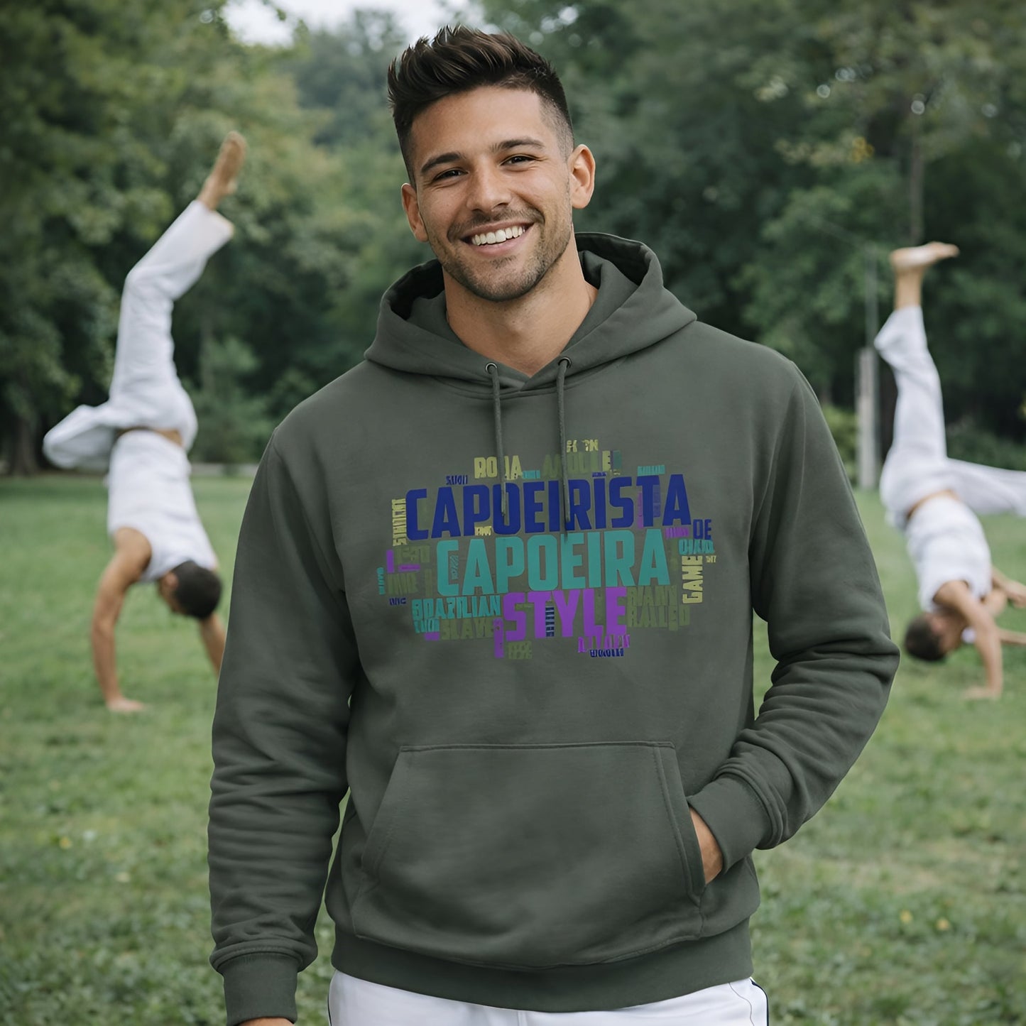 Alt Tag: Capoeira Sustainable Unisex Hoodie in organic cotton, green hoodie with capoeira graphic, model outdoors with capoeira dancers