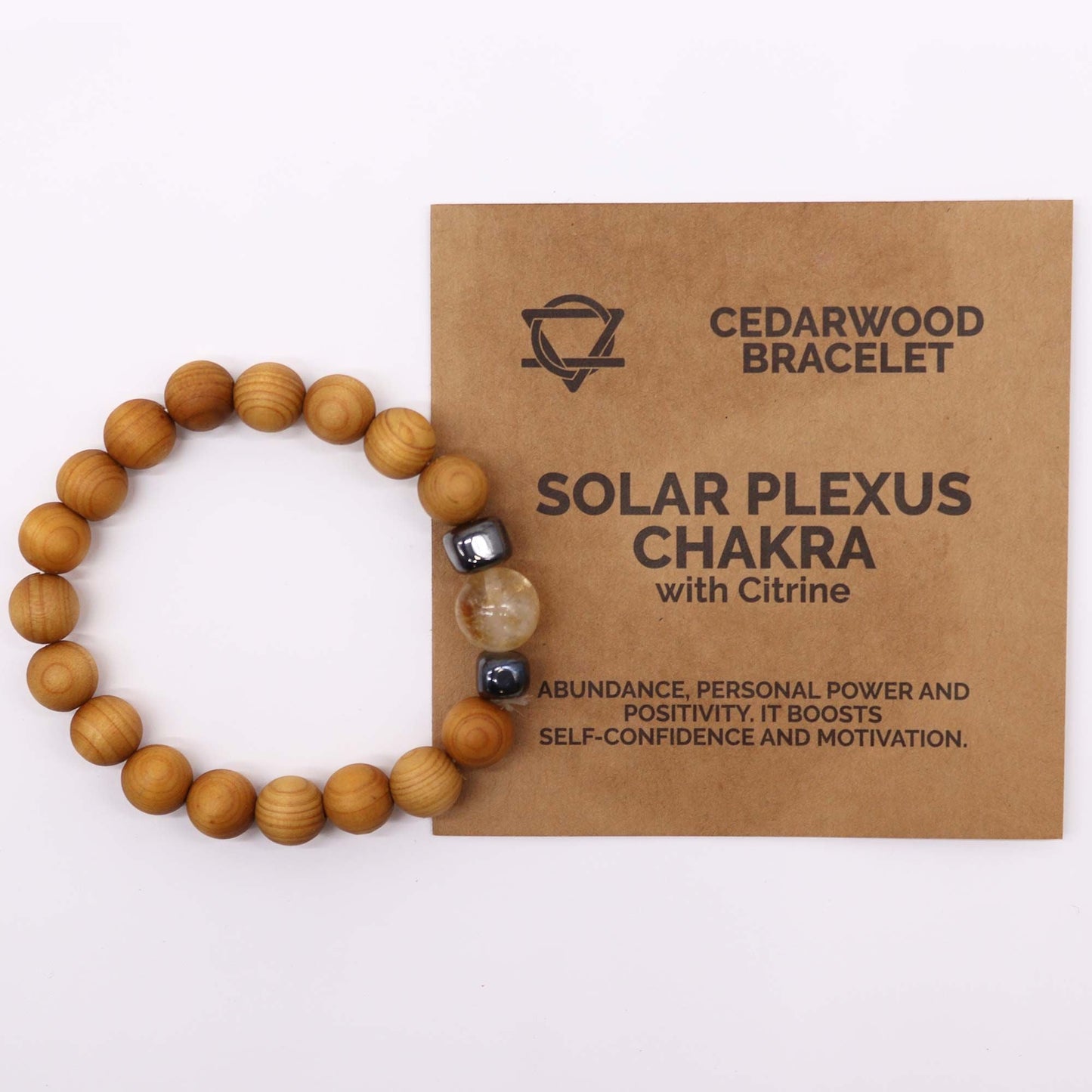 Alt Tag: Cedarwood Citrine Chakra Bangle – 7CM cedarwood bead bracelet with citrine and solar plexus chakra card on beige packaging