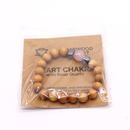 Cedarwood Heart Chakra Bangle – Rose Quartz with cedarwood beads and rose quartz heart charm in packaging
