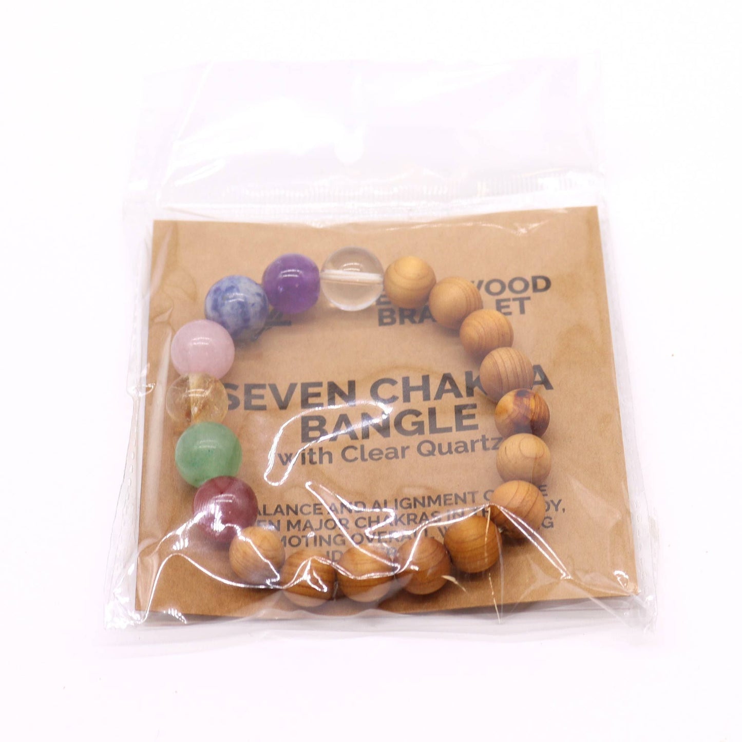 Cedarwood Seven Chakra Bangle – Natural Beads bracelet with cedarwood beads and seven chakra stones in clear plastic packaging