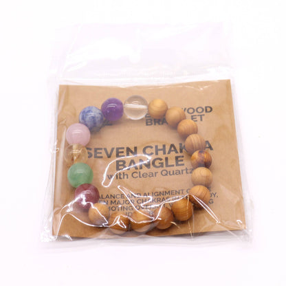 Cedarwood Seven Chakra Bangle – Natural Beads bracelet with cedarwood beads and seven chakra stones in clear plastic packaging