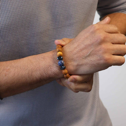 Cedarwood Throat Chakra Bangle – Sodalite, 7 CM on wrist, cedarwood beads with blue sodalite gemstone bracelet close-up