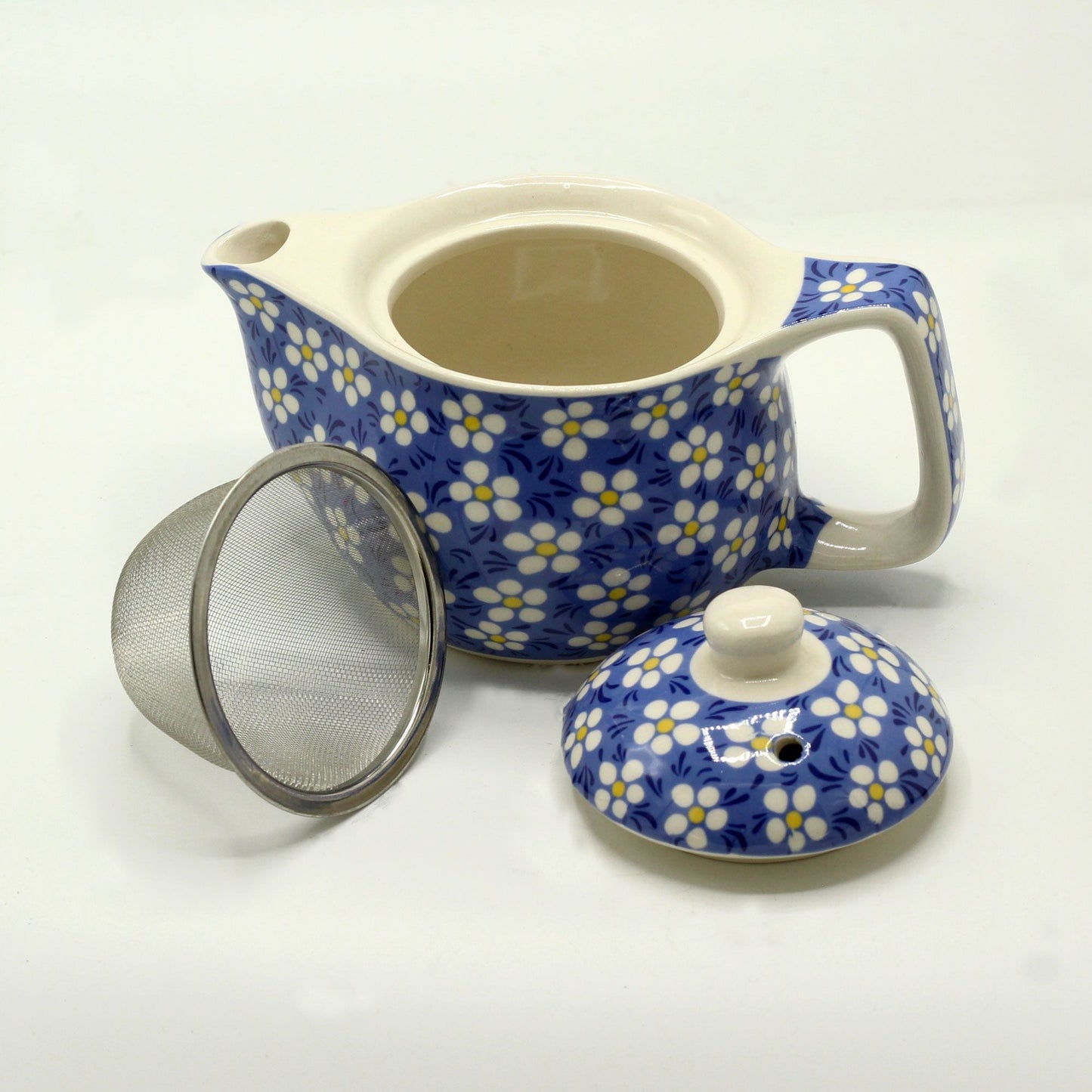 Alt Tag: Ceramic Herbal Teapot – Blue Daisy 350ML teapot de cerámica azul con diseño de margaritas, tapa y colador metálico