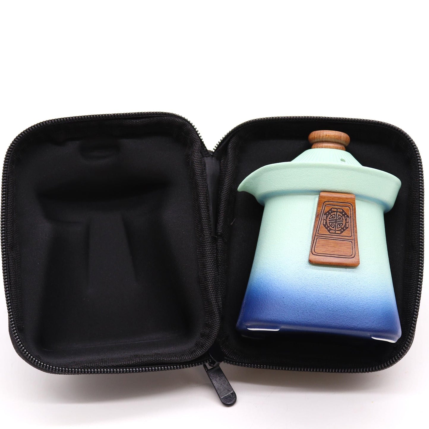 Ceramic Herbal Teapot Set – Blue Heaven Edition teapot with blue gradient glaze and lid, shown inside black zip travel case