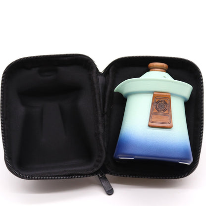 Ceramic Herbal Teapot Set – Blue Heaven Edition teapot with blue gradient glaze and lid, shown inside black zip travel case