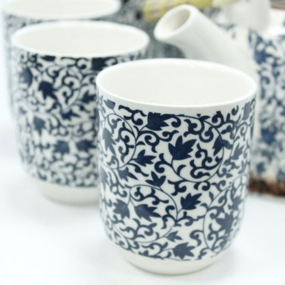 Alt Tag: Ceramic Herbal Teapot Set – Blue Pattern, 6 Cups with matching ceramic cups featuring blue floral pattern