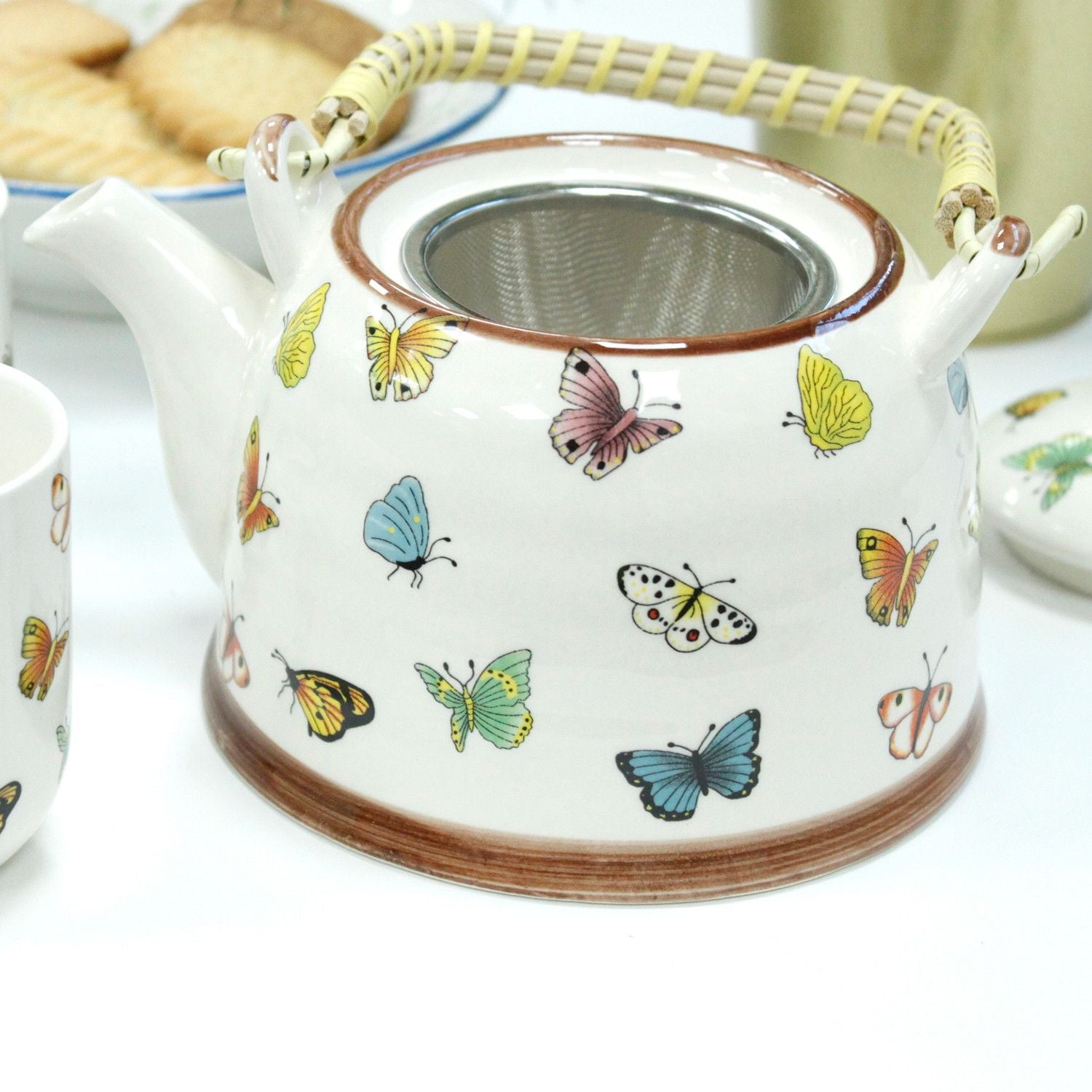 Ceramic Herbal Teapot Set – Butterflies – 6 Cups ceramic teapot with butterfly pattern, bamboo handle and stainless steel infuser
