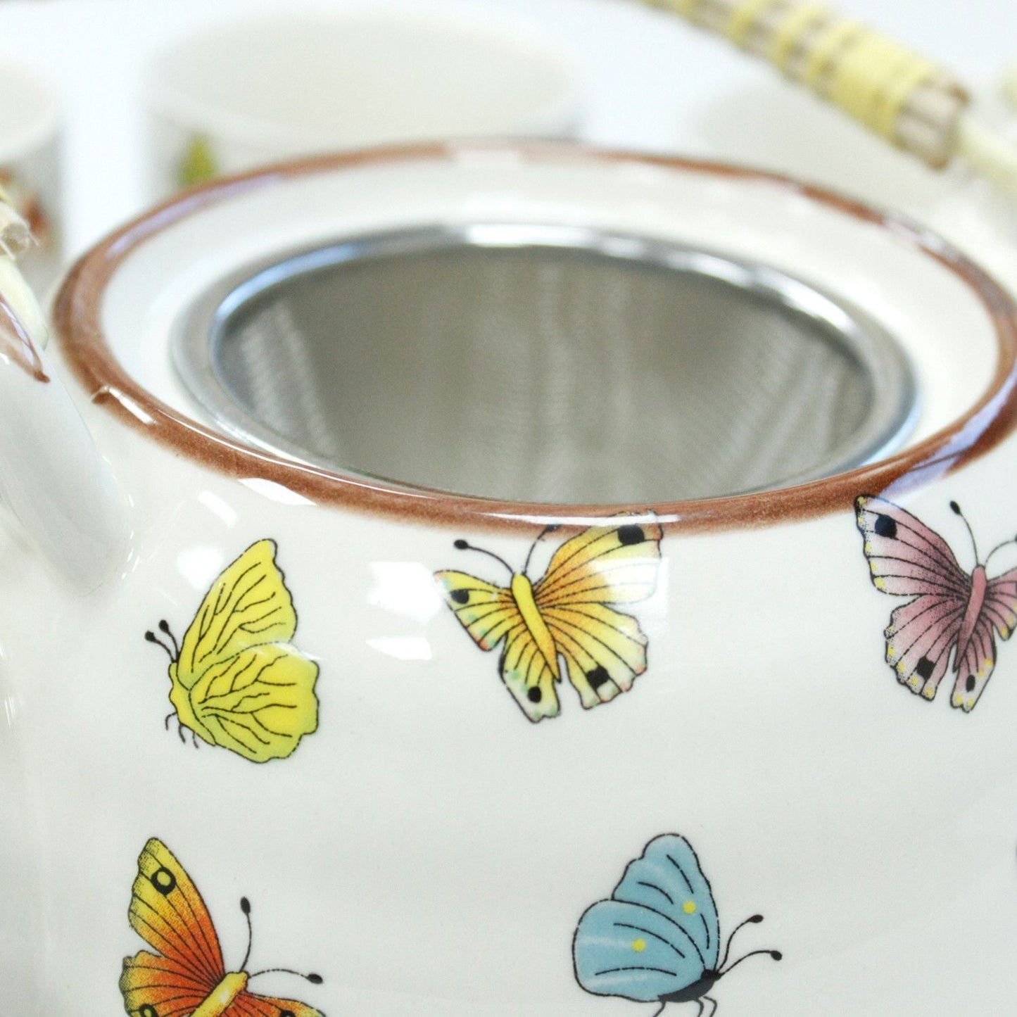 Ceramic Herbal Teapot Set – Butterflies – 6 Cups ceramic teapot with butterfly design and stainless steel infuser