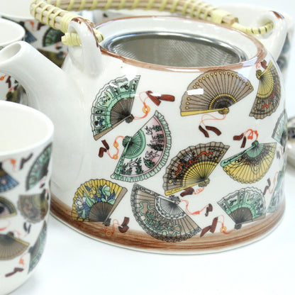 Alt Tag: Ceramic Herbal Teapot Set – China Fans Design ceramic teapot with metal strainer and matching cup, colorful fan pattern