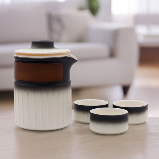 Alt Tag: Ceramic Herbal Teapot Set – Travel Pack ceramic teapot with gradient design and three matching tea cups on table