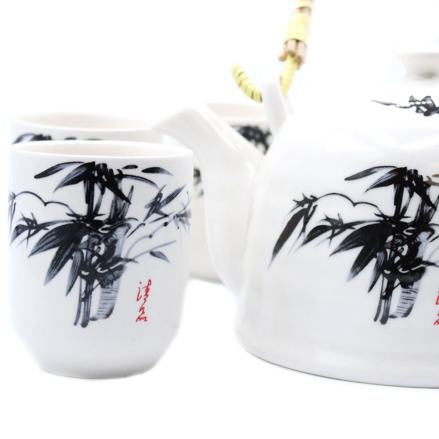 Ceramic Herbal Teapot Set – White Stone, 6 Cups con tetera y taza de cerámica blanca, diseño oriental de bambú en negro