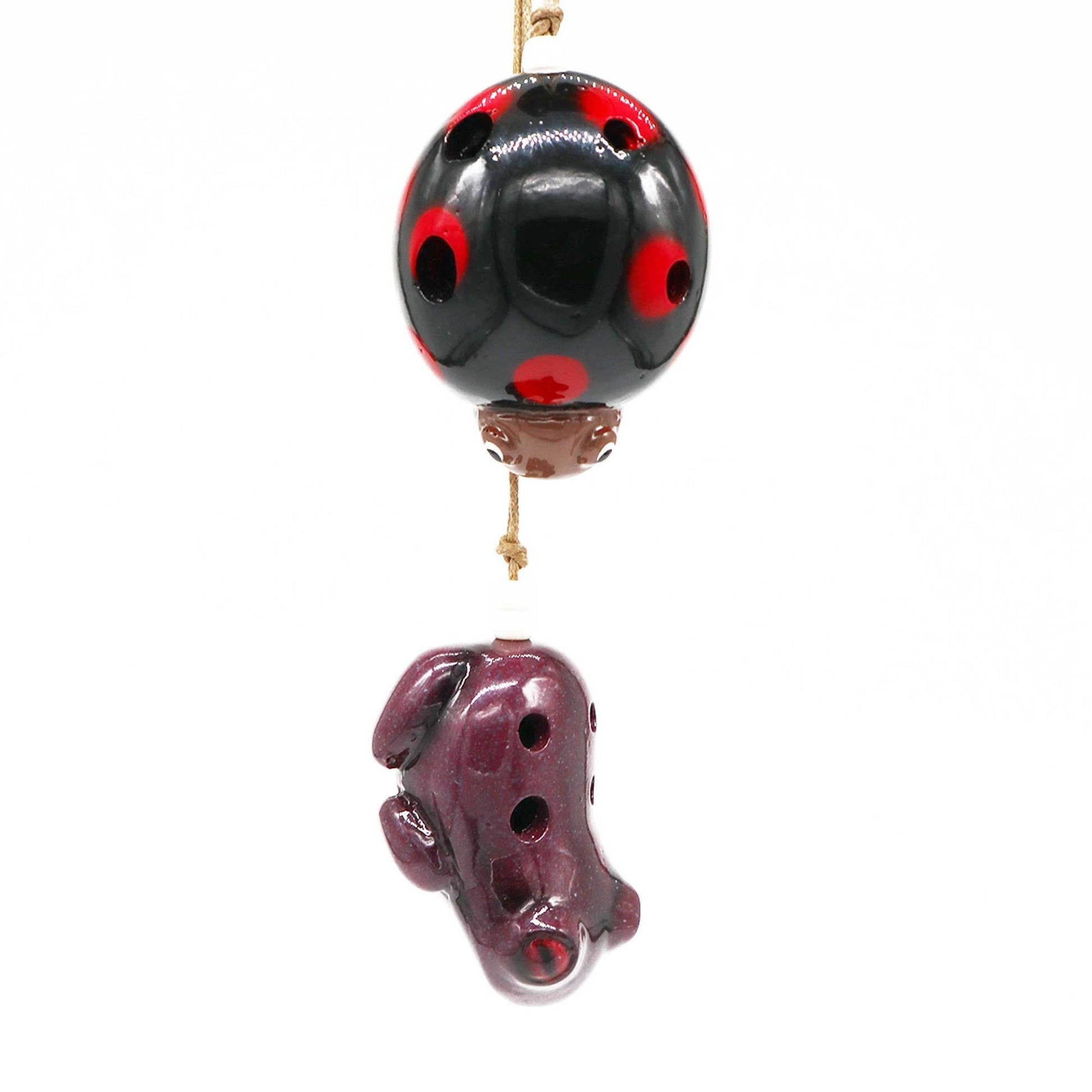 Ceramic Ocarina – Ladybird Design, glazed ladybird-shaped ceramic ocarina with hanging cord, black and red finish