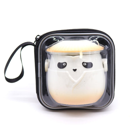 Alt Tag: Ceramic Panda Teapot Set – Orange ceramic panda teapot with orange lid inside clear zip travel case