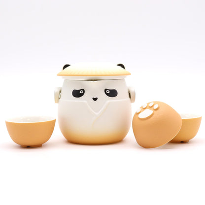 Ceramic Panda Teapot Set – Orange with ceramic panda teapot and three orange cups, playful panda design on white background