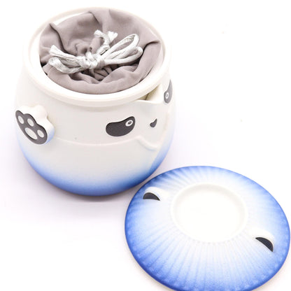 Ceramic Panda Teapot Set – Sky Blue with panda-face ceramic teapot, sky blue gradient lid, and fabric tea pouch insert