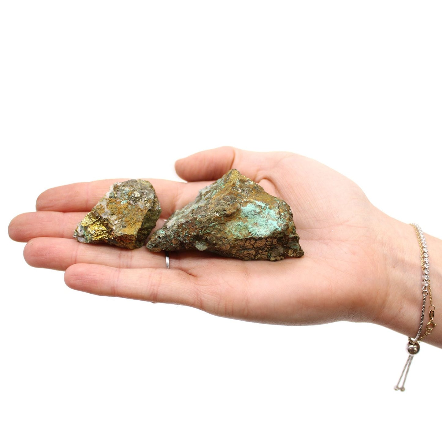Chalcopyrite Mineral Collection – Approx. 80 Pieces, chalcopyrite stones in hand on white background