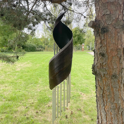 Alt Tag: Chocolate Coconut Leaf Wind Chimes – 50x13 CM hanging outdoors, handcrafted Bali coconut leaf with metal chime tubes