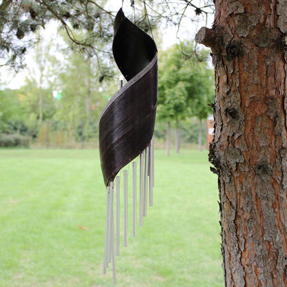Alt Tag: Chocolate Coconut Leaf Wind Chimes – 50x13 CM hanging outdoor on tree, handcrafted Bali coconut leaf spiral with metal tubes