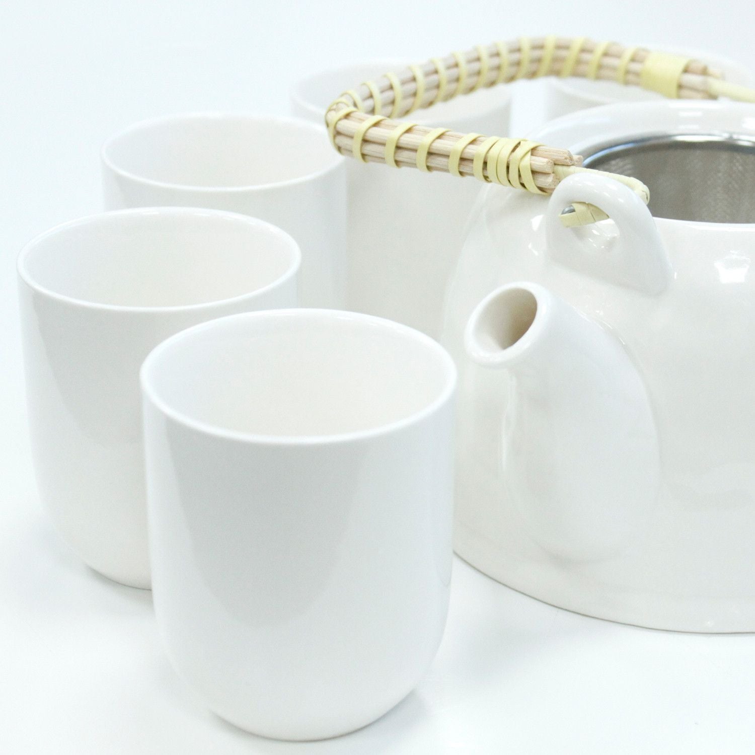 Classic White Herbal Teapot Set – 850ML, 6 Cups, white ceramic teapot with bamboo handle and matching cups