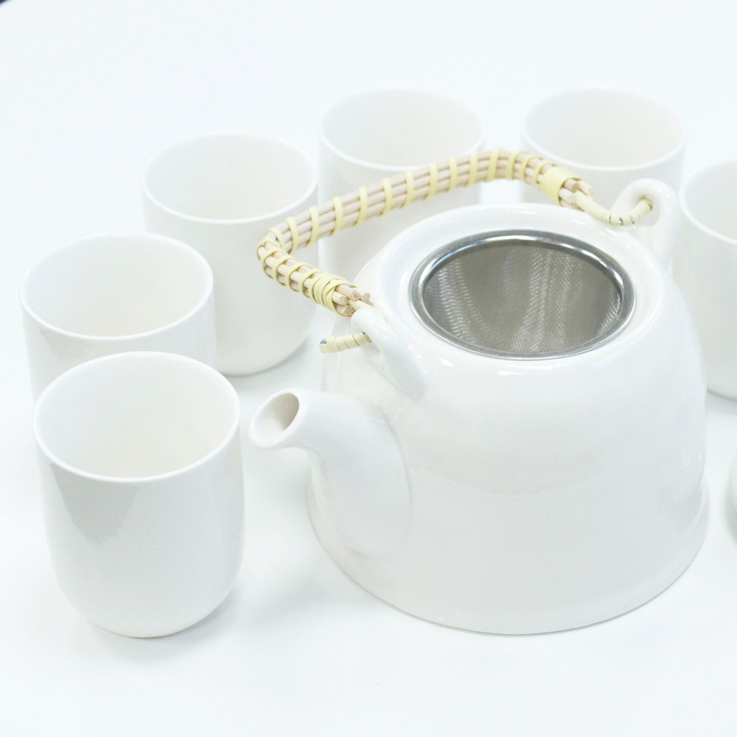 Alt Tag: Classic White Herbal Teapot Set – 850ML, 6 Cups ceramic white teapot with metal infuser and six cups