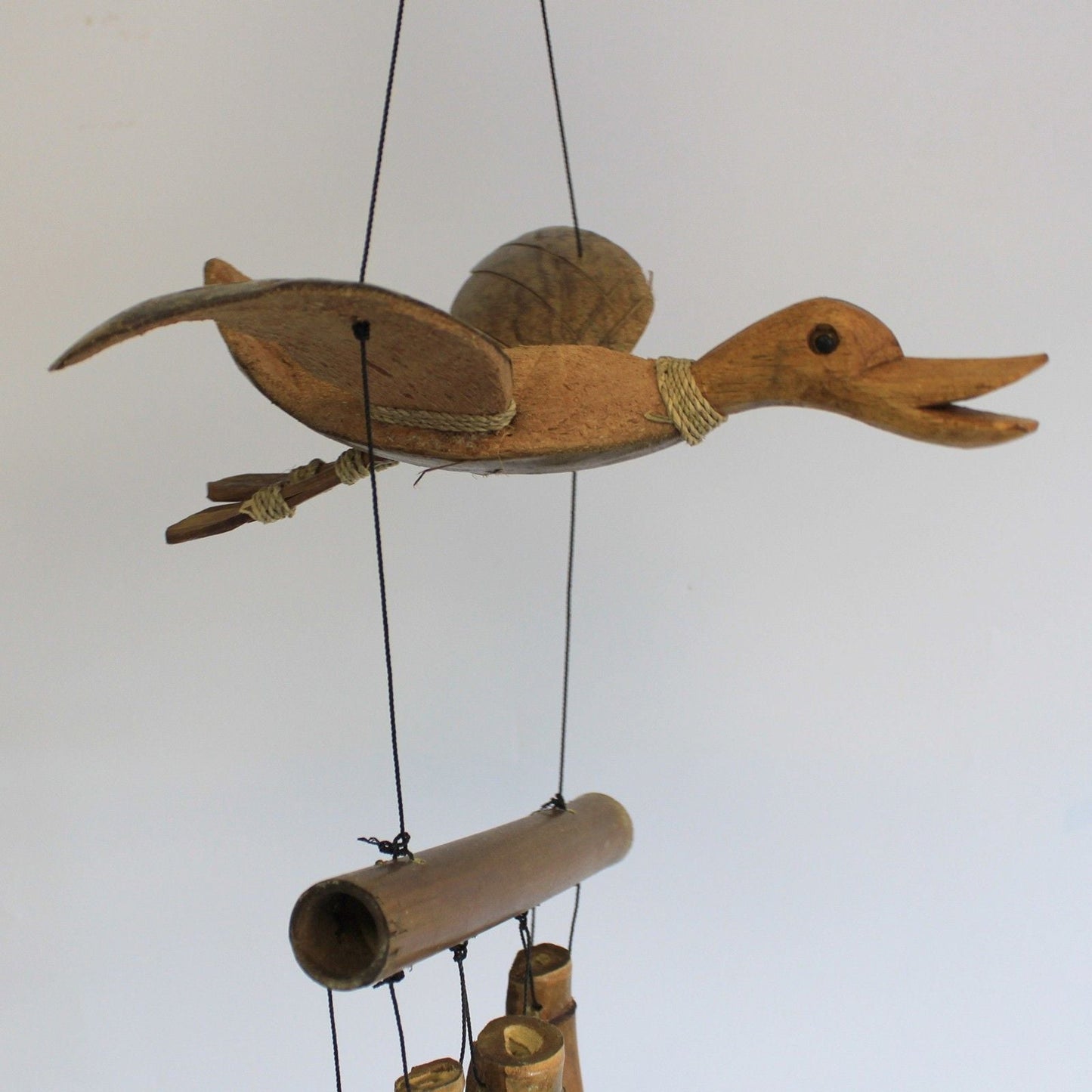 Alt Tag: Coconut Bamboo Wind Chime – 100 CM duck-shaped coconut and bamboo wind chime hanging decor, 1 meter outdoor garden ornament