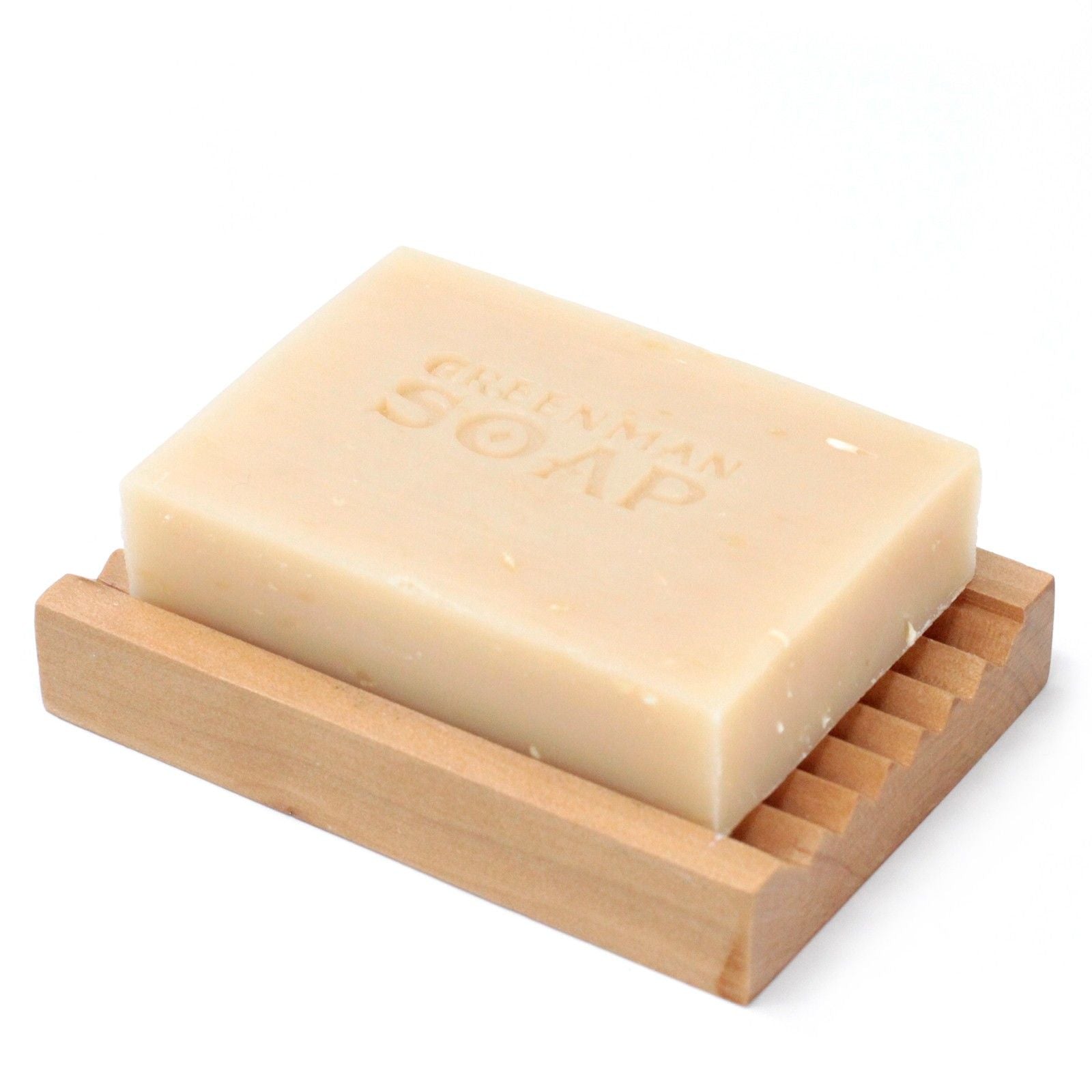 Alt Tag: Coconut Cool & Calm Soap – 100G barra de jabón natural color crema sobre jabonera de madera