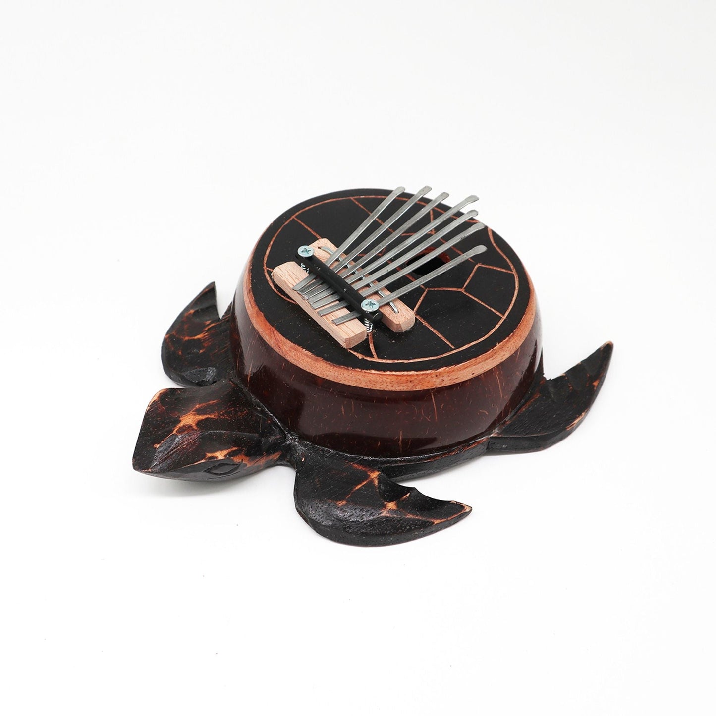 Alt Tag: Coconut Shell Thumb Piano – Antique Turtle Design, handcrafted Balinese kalimba with etched turtle motif and metal tines
