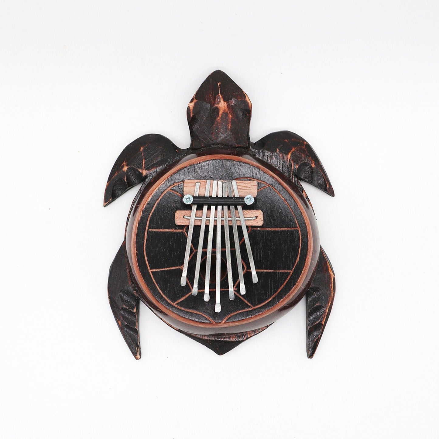 Alt Tag: Coconut Shell Thumb Piano – Antique Turtle Design, turtle-shaped coconut shell kalimba with metal tines, top view