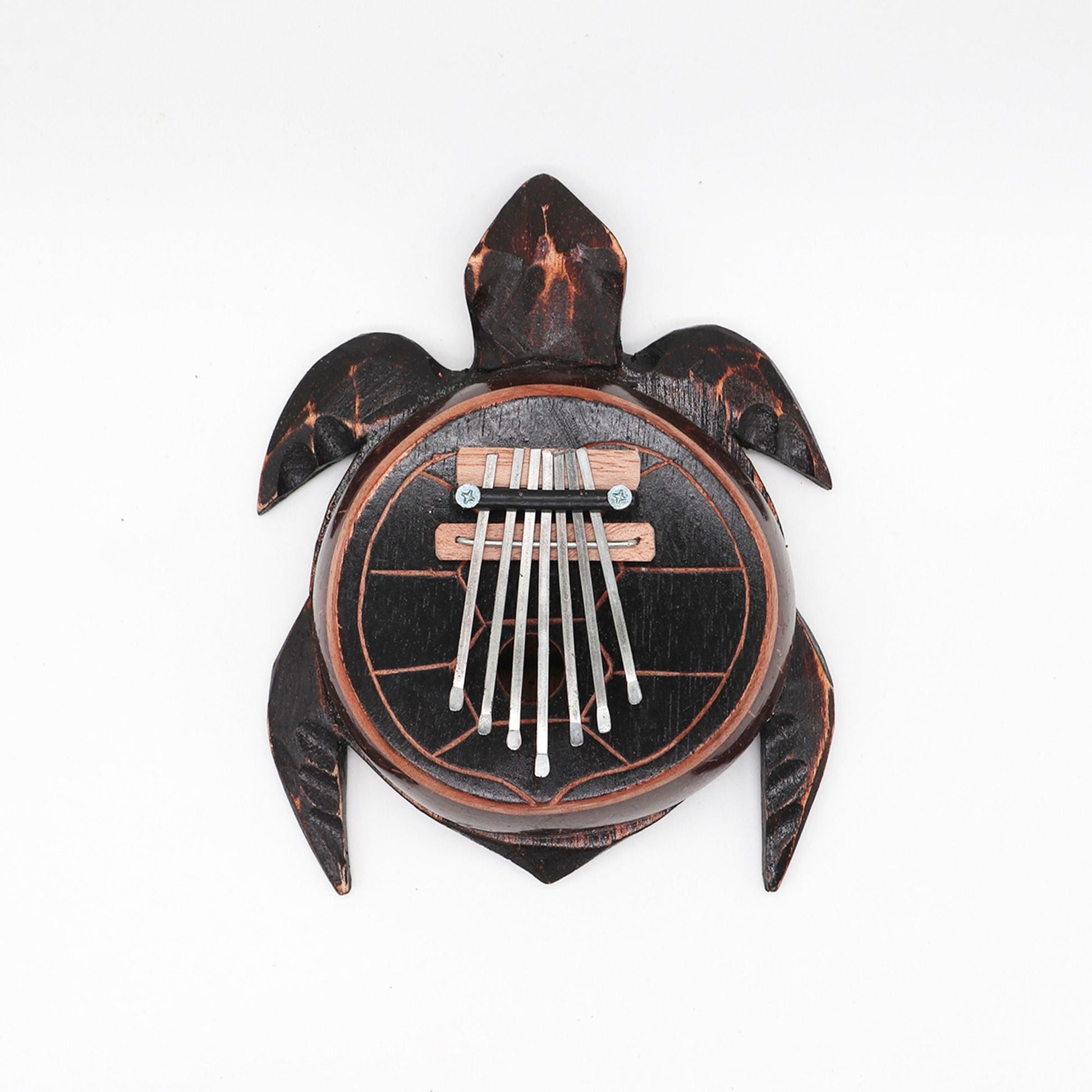 Alt Tag: Coconut Shell Thumb Piano – Antique Turtle Design, turtle-shaped coconut shell kalimba with metal tines, top view