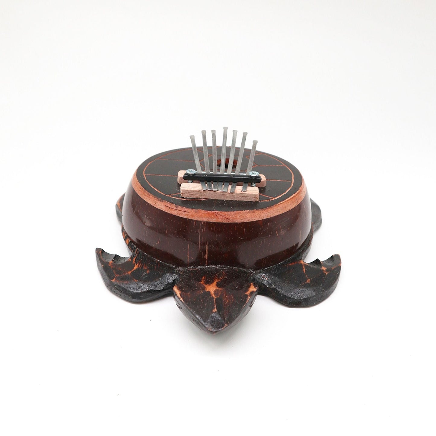 Alt Tag: Coconut Shell Thumb Piano – Antique Turtle Design, handcrafted Bali kalimba with etched turtle coconut shell on white background