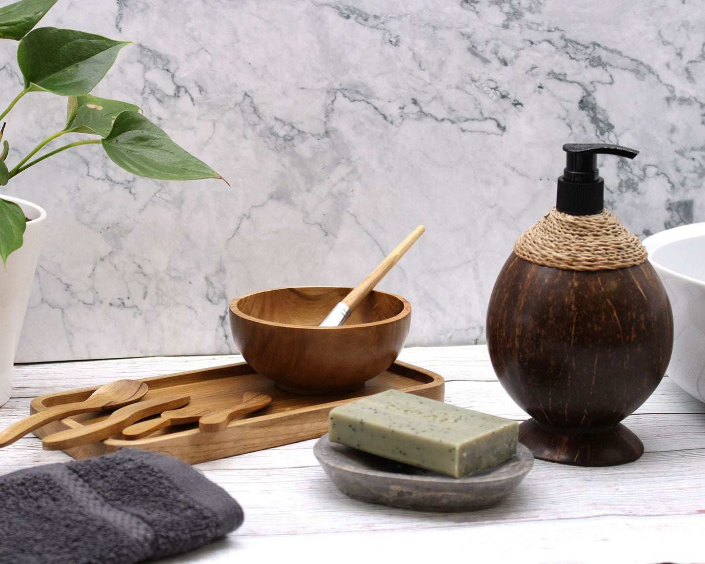 Alt Tag: Coconut Wood Soap Dispenser – 150ML on bathroom counter with pump top, natural coconut wood finish, soap bar and wooden accessories