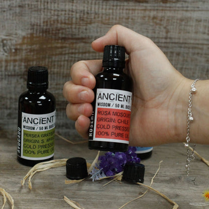 Cold Pressed Borage Oil – 50ML bottle held in hand, cold-pressed skincare oil in dark glass with dropper cap