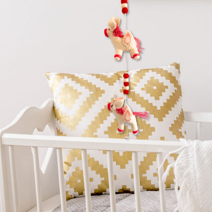 Alt Tag: Colorful Felt Unicorn Wall Hanging – 110CM hanging decor with colorful felt unicorns and pom-poms in nursery crib setting