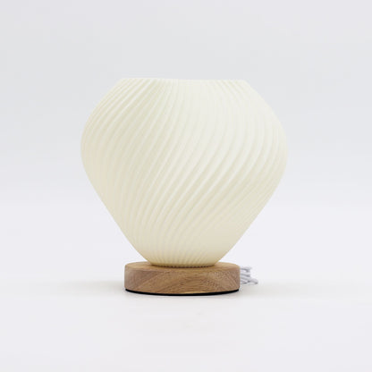 Alt Tag: Cornstarch PLA USB Lamp – Shell Twisted 18x13x17 CM white twisted shell lamp on wooden base with USB cable