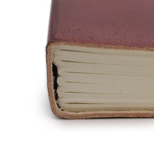 Cosmic Goddess Leather Notebook – Medium 20.5 CM close-up of brown leather cover and thick unlined pages, handcrafted vegetable-tanned leather