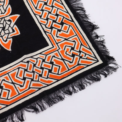 Alt Tag: Cotton Esoteric Altar Cloth – Earth Mother black cotton altar cloth corner with orange geometric border and fringed edge