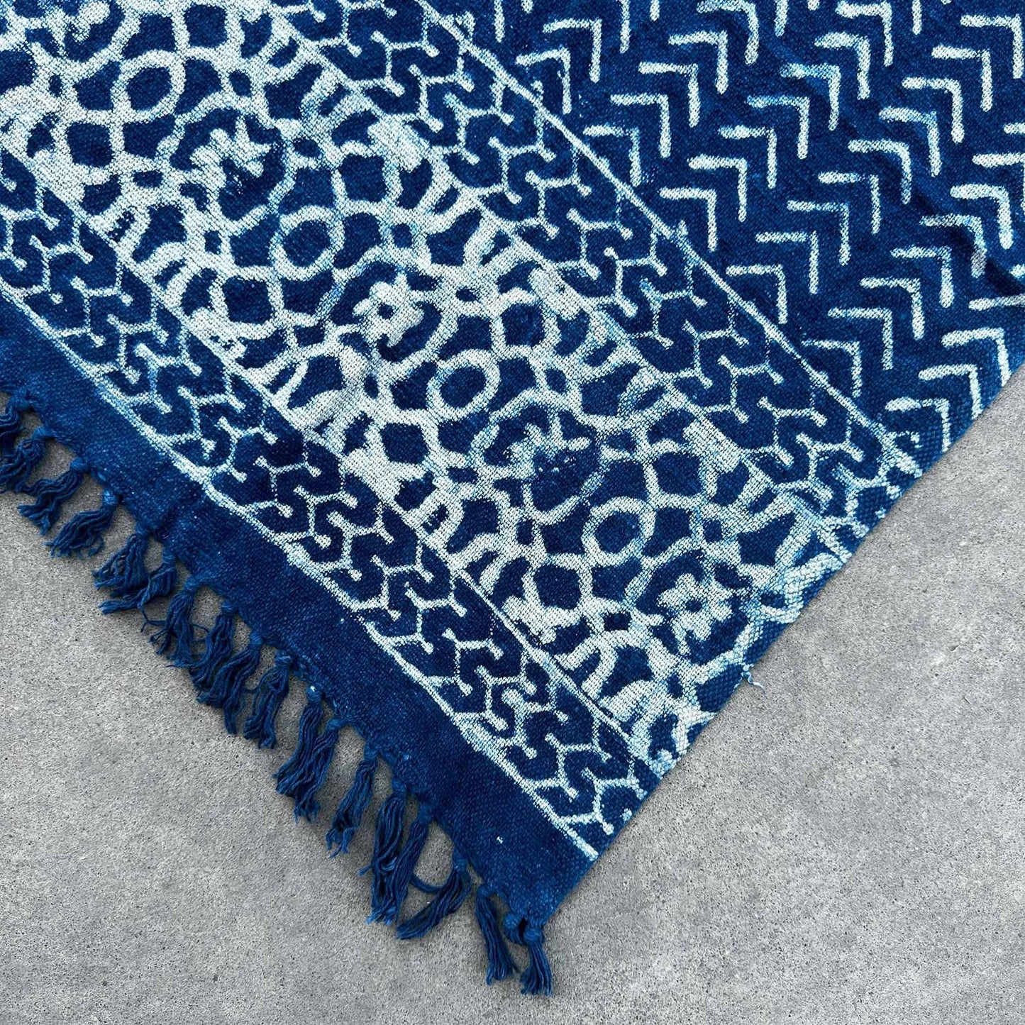 Cotton Handmade Indigo Throw – 170x120 CM with blue and white geometric pattern and fringed edge