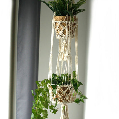 Alt Tag: Cotton Macrame Pot Holder – Double Hanger with two hanging planters, natural cotton macrame cords and tassels by window